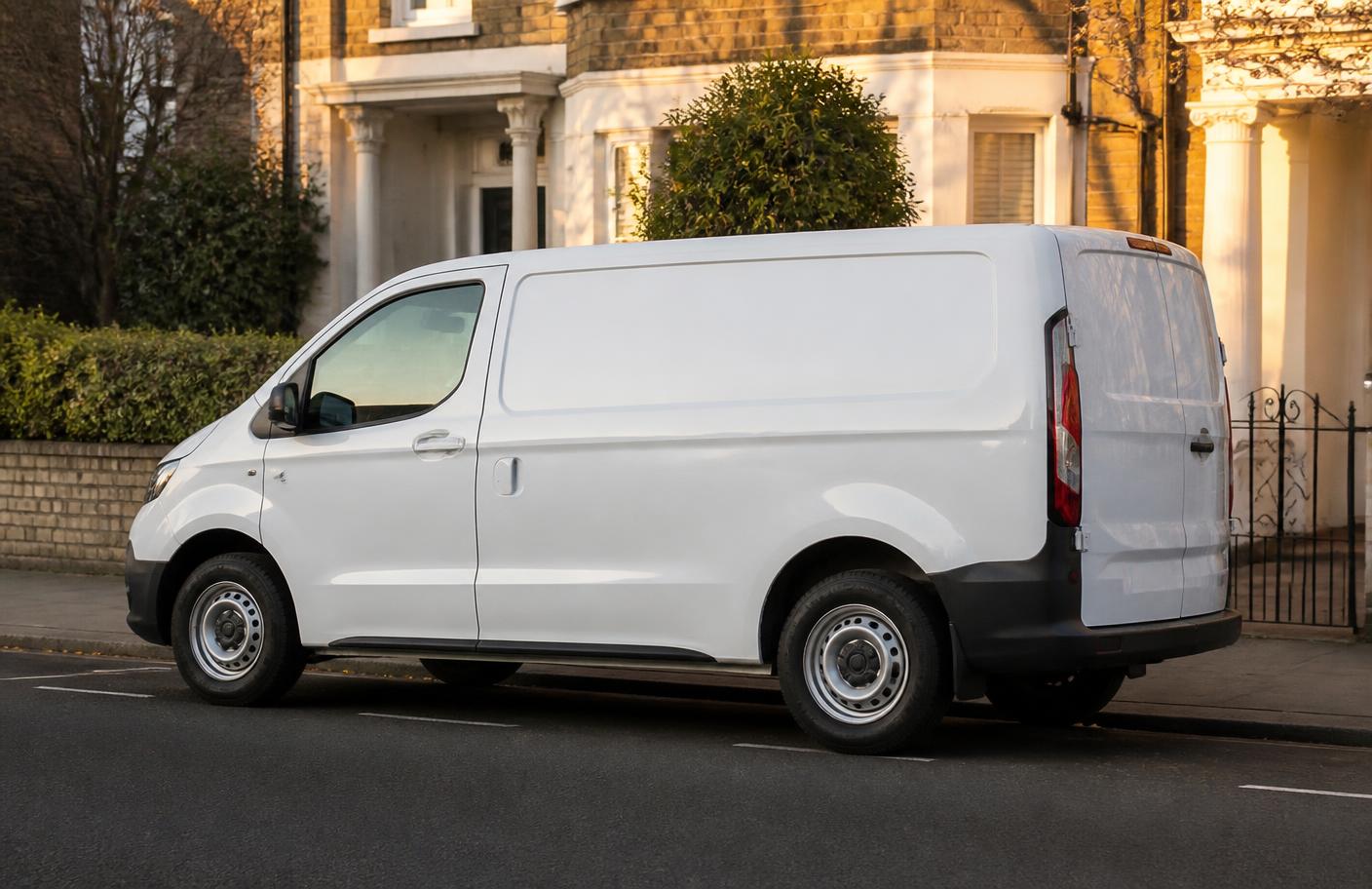 Mackenzie Plumbing service van on a London street